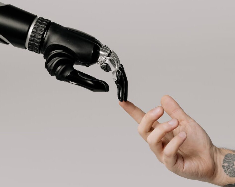 AI robot and human touching hands